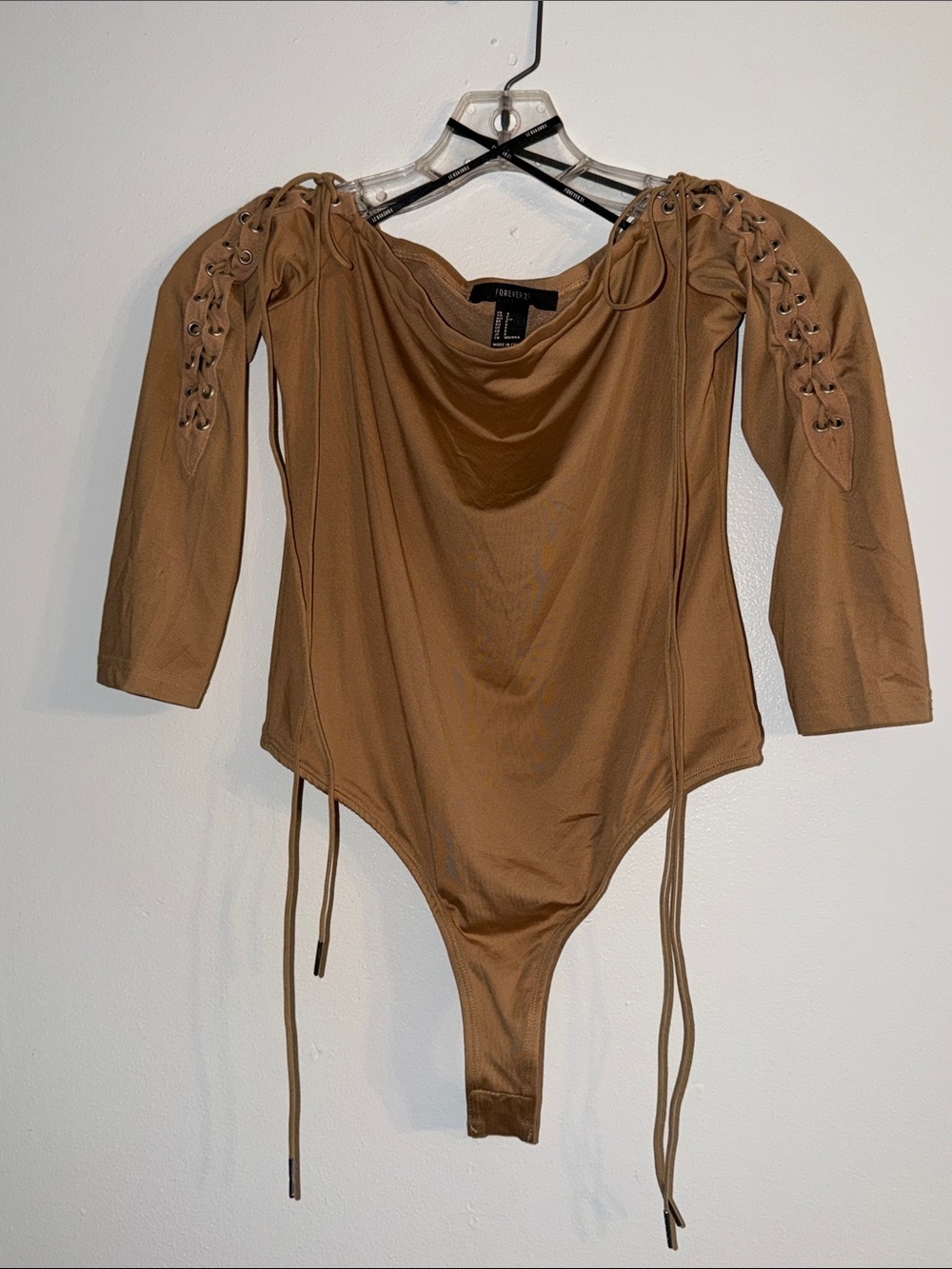 Forever 21 tan bodysuit with lace-up sleeves size S